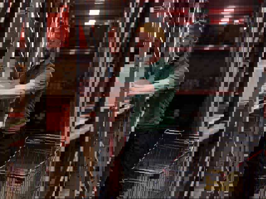 Warehouse worker using the zone order picking method to fulfil an order.